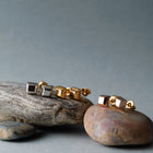 K18post クラフトトラぺゾイドピアス