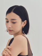 K18post ツイステッドフープピアス